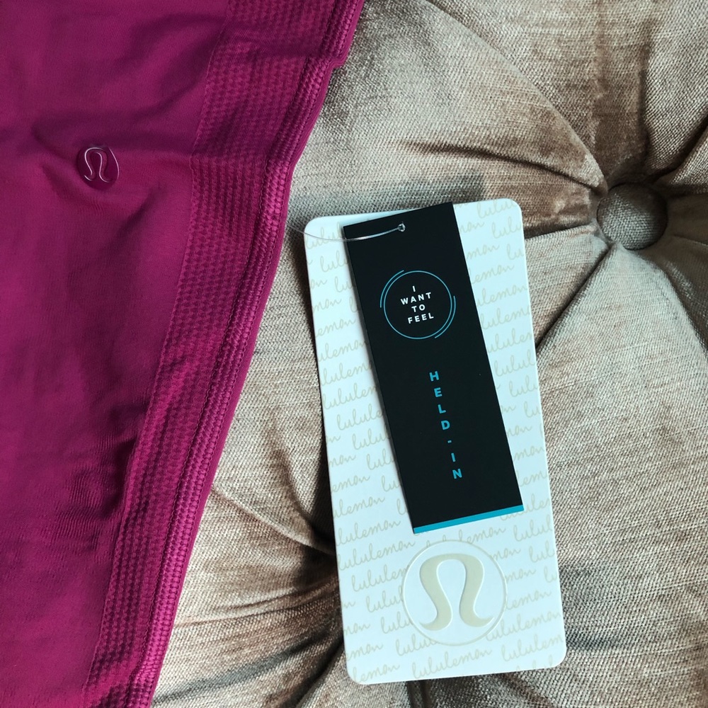 Lululemon compression pants new in a magenta pink.
